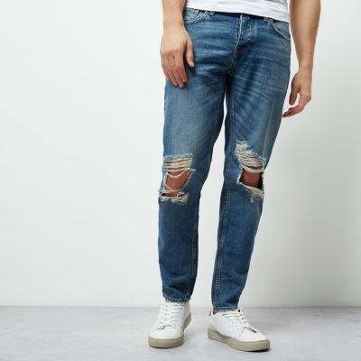 Dark blue wash ripped Jimmy tapered jeans